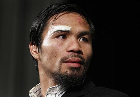 2013-05-07T045023Z_1_CBRE9460DG400_RTROPTP_2_CSPORTS-US-BOXING-PACQUIAO.jpg