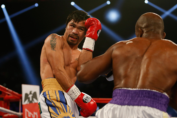 520251696-manny-pacquiao-avoids-a-punch-from-timothy-gettyimages.jpg