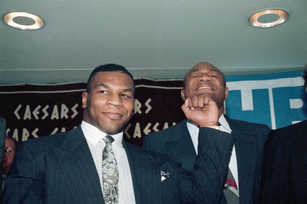 0_Tyson-Pretend-Punching-George-Foreman.jpg