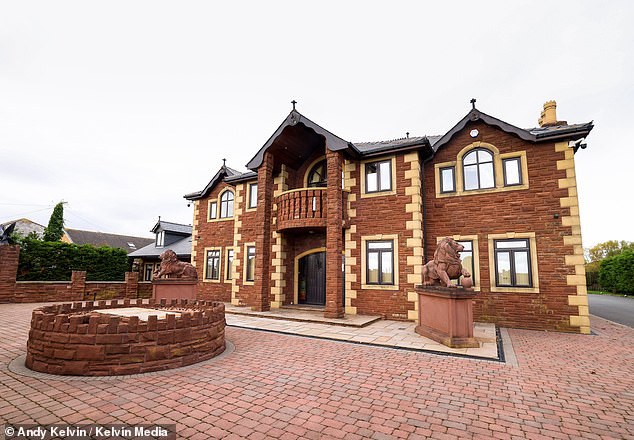 49127203-12852309-Nice_Fury_bought_the_imposing_property_for_1_695million_in_Dec.jpg